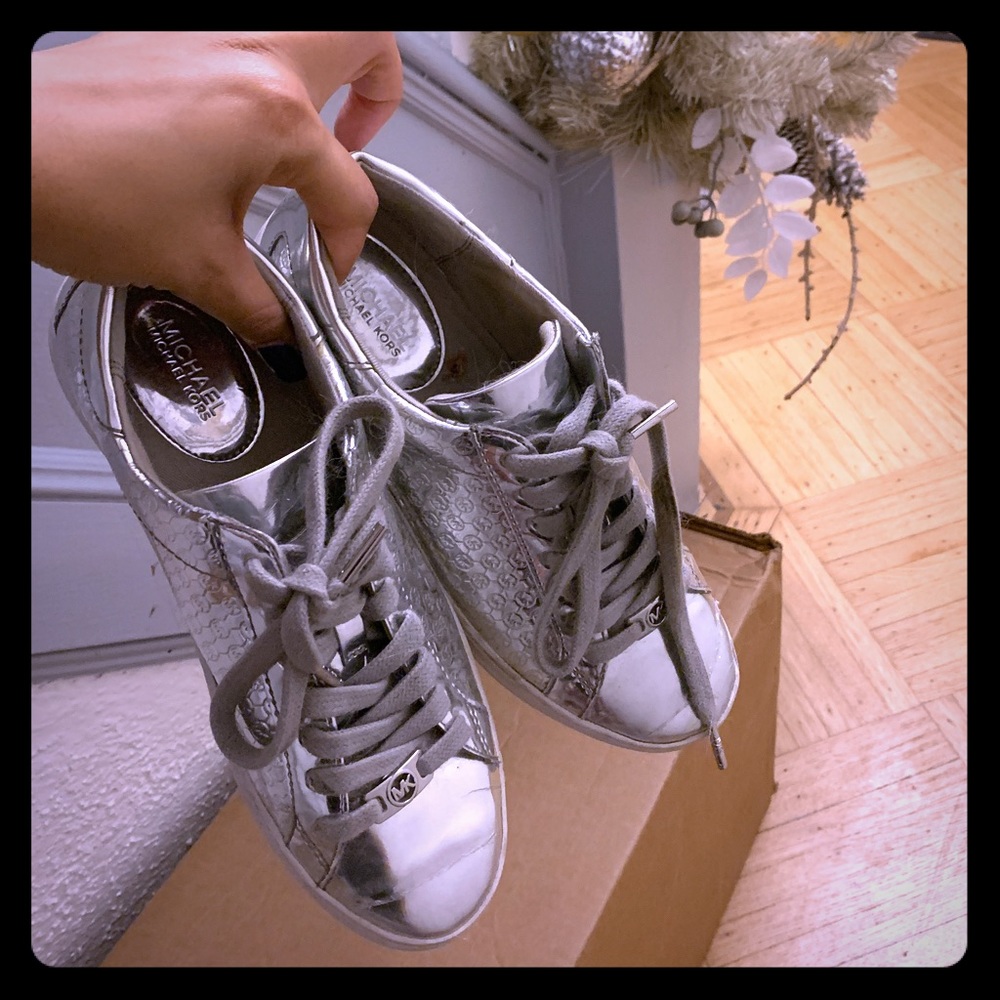 Silver size 8 women’s Michael Kors sneakers